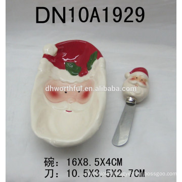 Ceramic bowl and butter knife with santa claus design